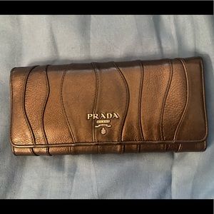 Prada metallic brown wallet